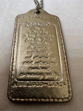 COACH Creed script Large Metallic Gold Leather Hangtag